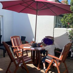 Hard wood garden table and chairs