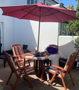 Hard wood garden table and chairs