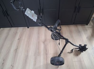 golf clubs, trolley and bag