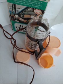 vintage coffee maker plugs into cigarette lighter for car