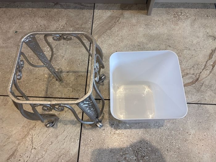 Silver metal square shape plant stand with matching white plastic pot