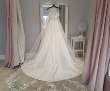 Beautiful cathedral length veil with flower and subtle sparkle detail