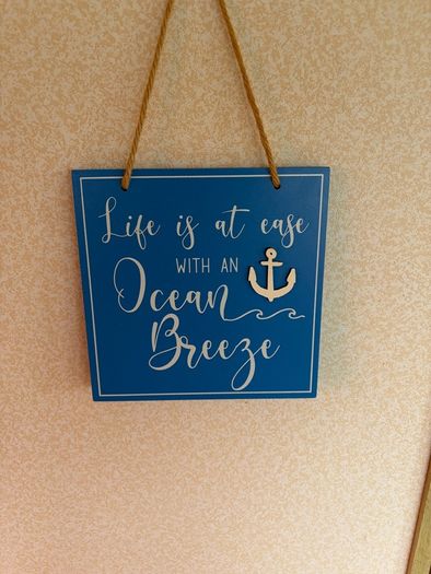 Nautical wall art and clock.