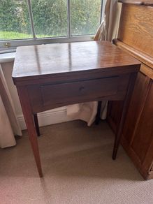 Sewing table with sewing machine