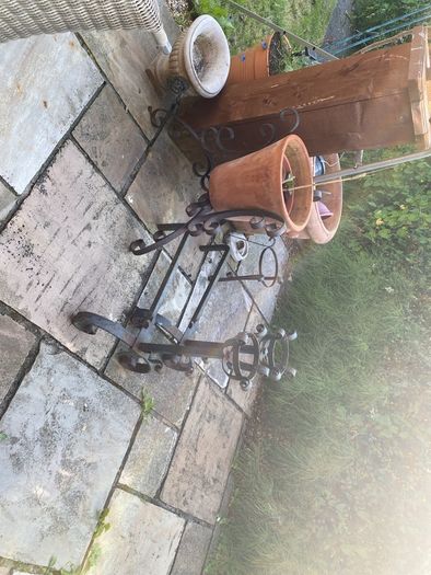 pair of cast iron fire place legs