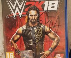 Signed WWE RAW ring and WWE2K18 PS4 game