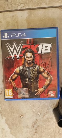 Signed WWE RAW ring and WWE2K18 PS4 game