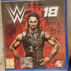 Signed WWE RAW ring and WWE2K18 PS4 game