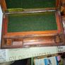 19th Century Victorian writing slope. It features a hinged lid that opens to create a sloped writing surface, traditionally lined with velvet. The box includes built-in compartments for storing pens, inkwells, and documents., postage available Image 2