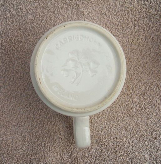 NIZORAL SHAMPOO (Janssen) - a scarce promotional mug made by Carrigdhoun Co-Op pottery of Carrigaline, County Cork (late 1980s)