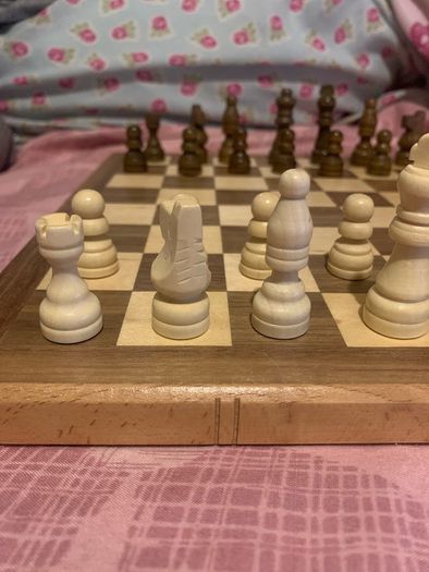 Boxed wooden chess board, prices and checkers set
