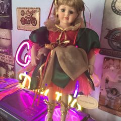 Leonardos collectors porcelain doll