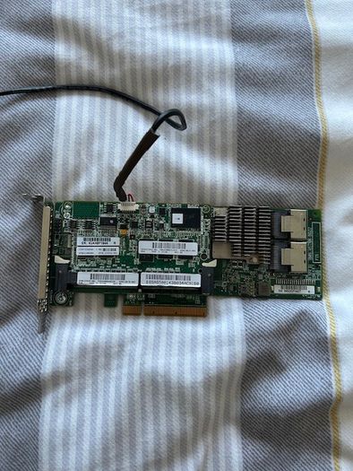HP Smart Array P420 PCI-e SAS 1GB with battery.