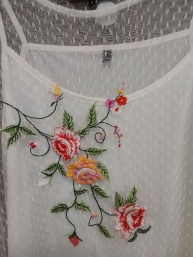 White embroidered top by Vero Moda.