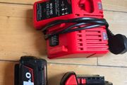 Milwaukee batteries + Charger