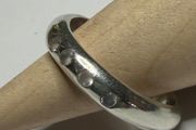 Handmade sterling silver ring with white CZ stones. Size M