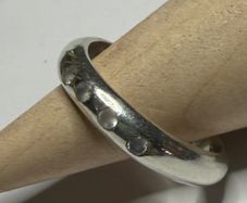 Handmade sterling silver ring with white CZ stones. Size M