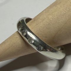 Handmade sterling silver ring with white CZ stones. Size M