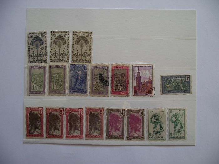 The collection of old stamps from French colonies on stock cards