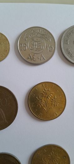 Coins a mix of different countries 28 coins in total registered post included