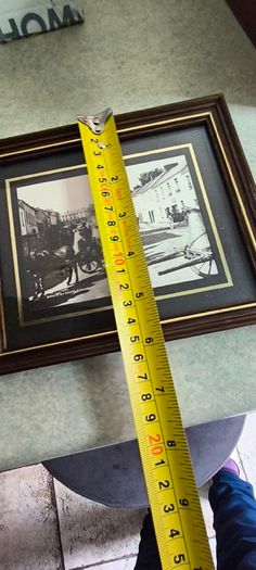 Is 3 pictuer Framed Le Tisserand Jacquard woven silk picture featuring a windmill 30.00 euro , old photo from Charleville, Co. Cork 18 euro, framed Holy post card  Pieta , Love and Honor Jesus 12 euro..