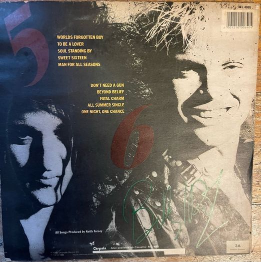 Rare Billy Idol promotional copy Zimbabwe release of whiplash smile. Vinyl is nm and sleeve is vg