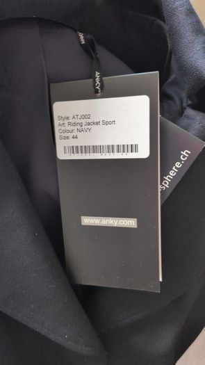 Women's showjumping jacket and jodhpurs