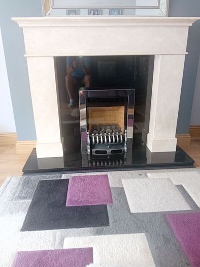 marble fire place  ready to be collected .