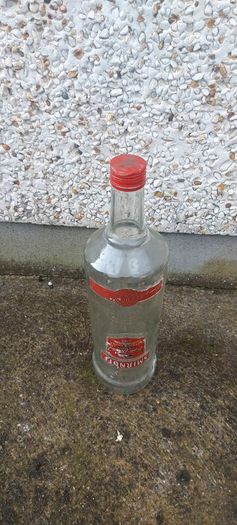 Smirnoff volka 3 litre bottle ,,with cork ,nice patina condition, handy for 1 or 2 euro coins ,etc ,,or display advertising item for home bar etc ,sold as is,