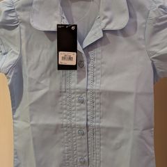 Short sleeve next blouses and navy shorts for under pinafore