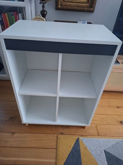 White storage cabinet with four compartments