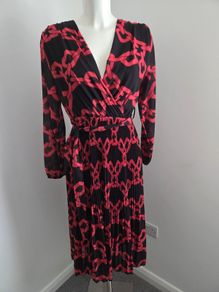 Never Worn. One size (10-14) J&L Pleated dress with flattering crossover v-neck front