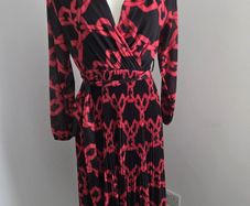 Never Worn. One size (10-14) J&L Pleated dress with flattering crossover v-neck front