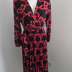 Never Worn. One size (10-14) J&L Pleated dress with flattering crossover v-neck front