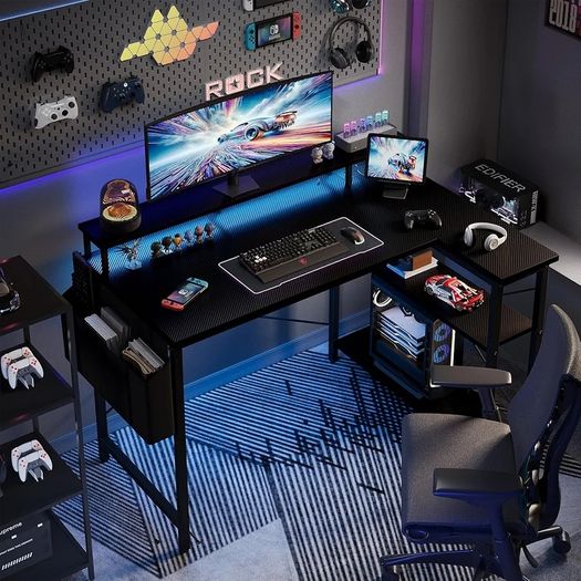 100cm Reversible L-Shaped Gaming Desk with Power Sockets & LED Lights, Carbon Fibre Computer Table with Long Monitor Stand, 2-Tier CPU Storage Shelves & Side Pouch, Black