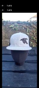 Trucker style cap with mallard patch