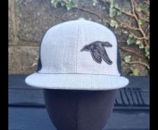 Trucker style cap with mallard patch