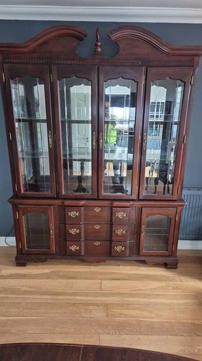 crystal cabinet, table with chairs