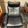 Pair of leather style armchairs with matching footstools Image 5