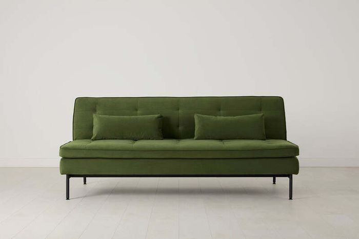 Vibrant green Swyft sofa bed couch with matching pillows (Colour not accurately reflected in own pictures, see listing for brands original pictures)