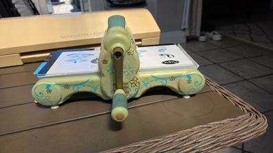 Sizzix die cutting machine & approx 100 dies with new cutting plates