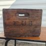 Old beer bottle crate stamped "C U B" and "8 66" Image 2