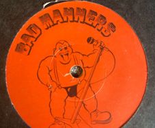 2 x Bad manners singles 1 of which is a long play ep in vg+ condition