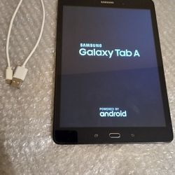 Samsung Galaxy Tab A with charging cable