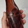401 - Vintage Thos Power Dungarvan Dark Amber Glass Collectible Decorative Bottle Image 5
