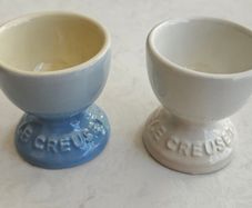 2 x Le Creuset stoneware Egg cups brand new! Coastal blue and Meringue cream colours