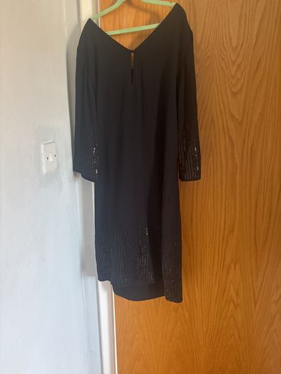 Four Black Dresses