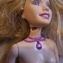 4 barbie dolls Image 8