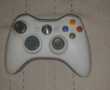One White XBox 360 Controller For Sale Here