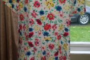 Peacocks Floral playsuit Perfect condition size UK20 EU48 Postage included